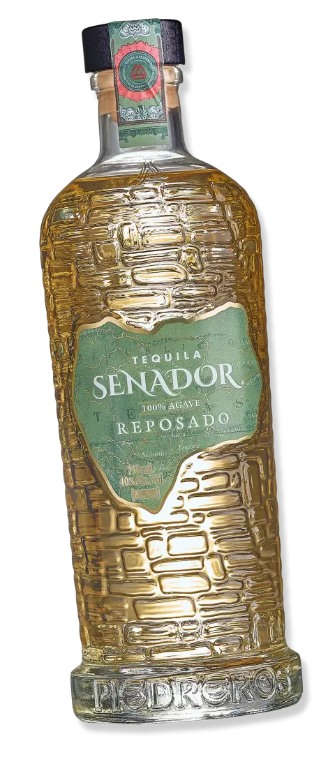 Senador Reposado — the map on the label, stone texture in the glass